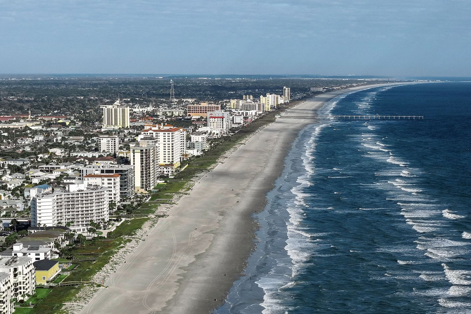Aerial view of Jacksonville Beach, its pier and the Atlantic coast